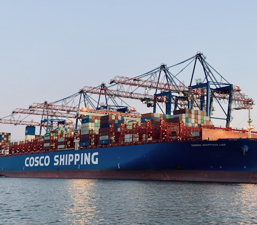 cargo ship on dock during daytime