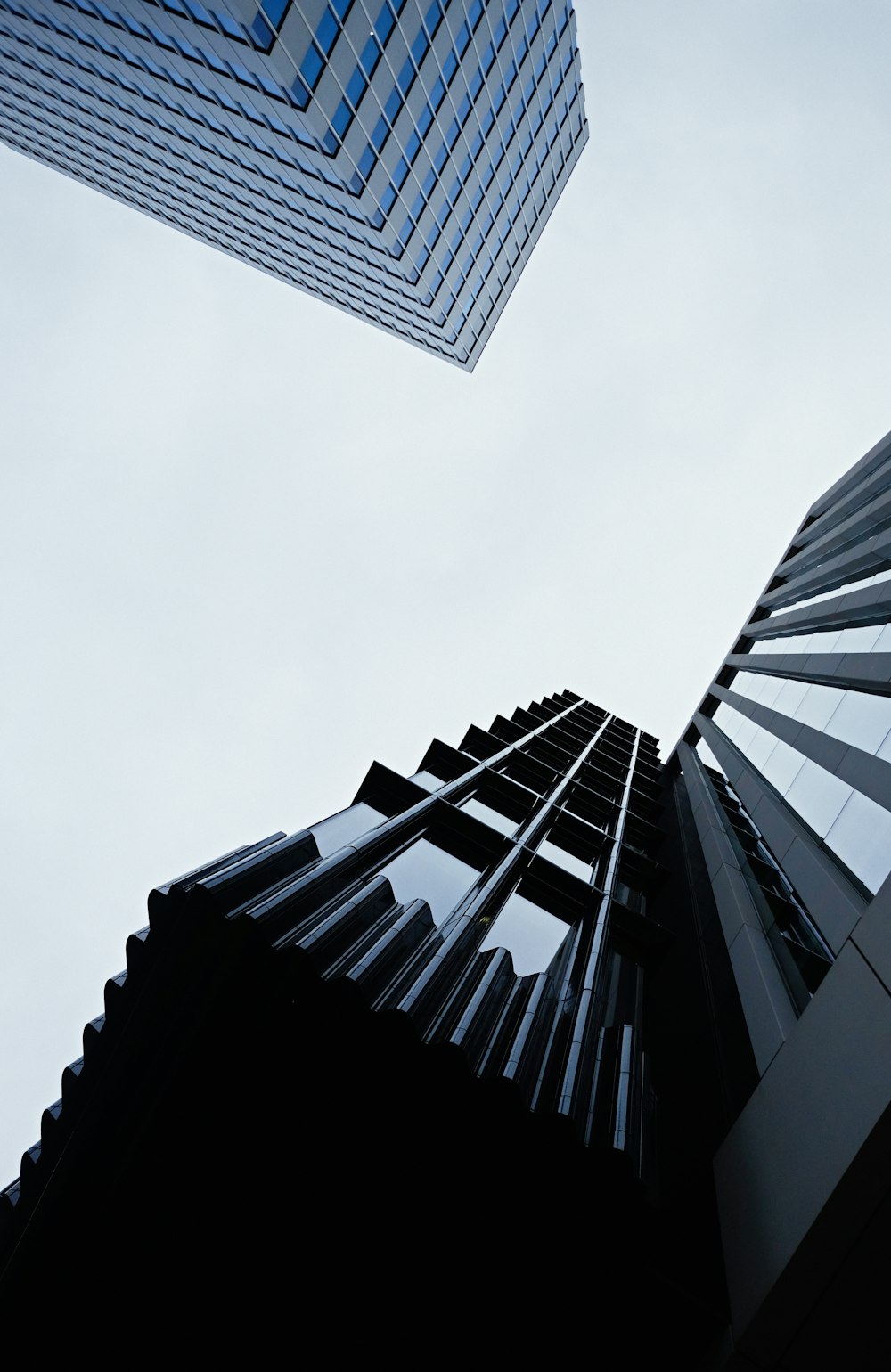 low angle photography of high rise building