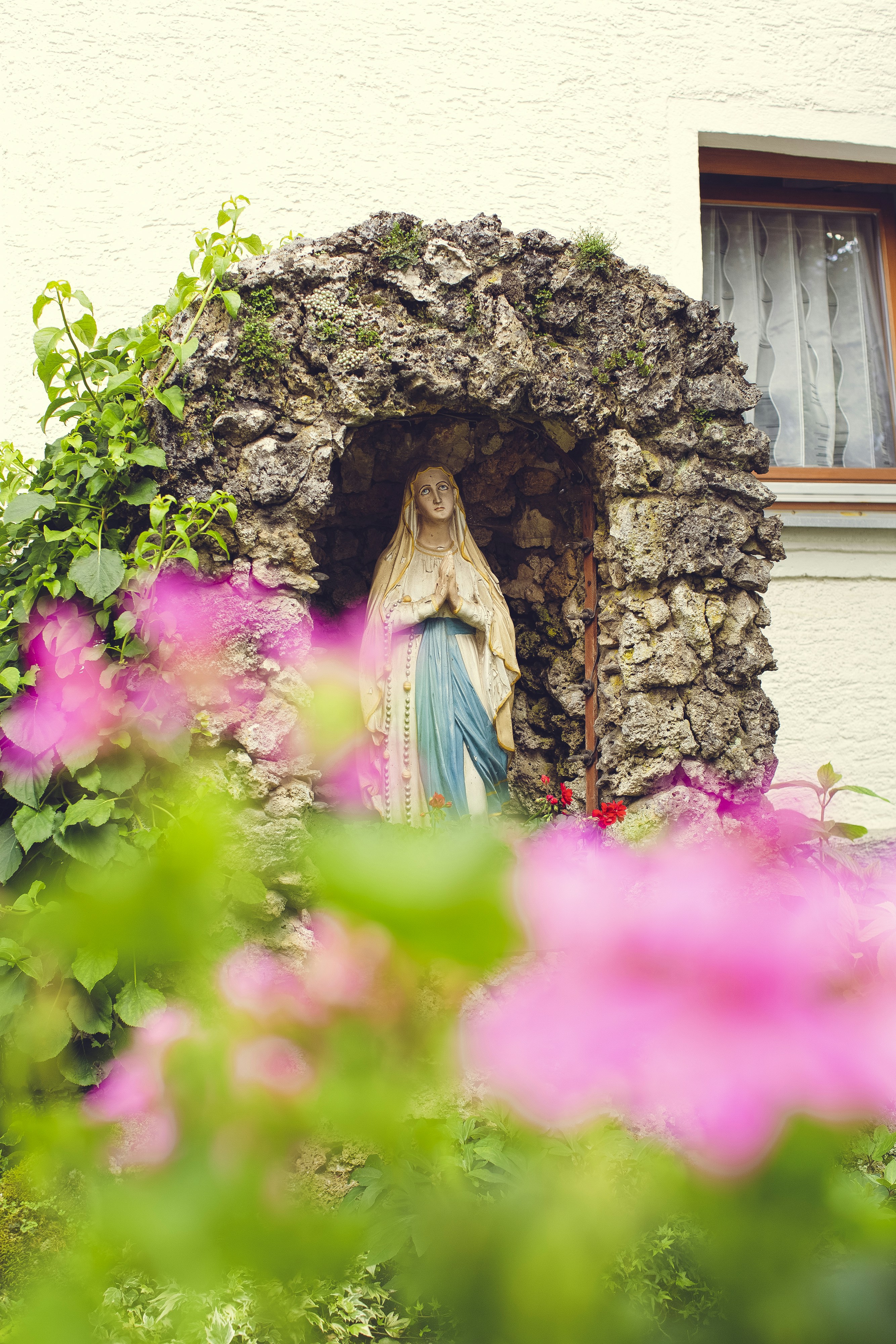woman wearing yellow long-sleeved dress under white clouds and blue sky during daytime
