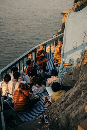A serene gathering of individuals engaged in spiritual learning.