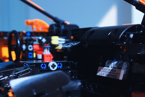 Close-up of a high-tech model featuring transparent materials and tiny LED lighting effects.