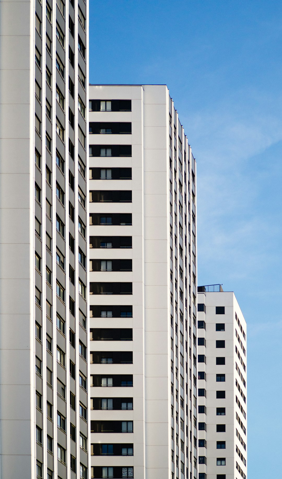 white concrete building under blue sky during daytime