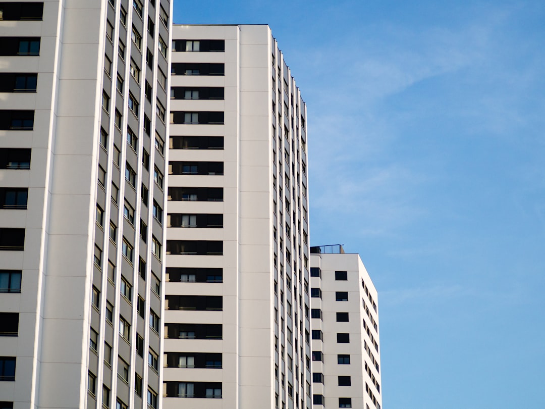 white concrete building under blue sky during daytime