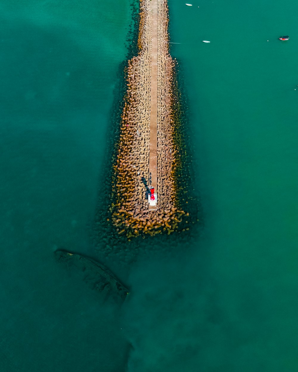 aerial view of white boat on sea during daytime