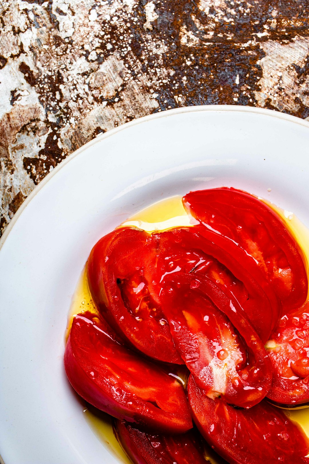 red chili on white ceramic plate