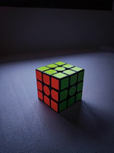 a rubik cube sitting on top of a table