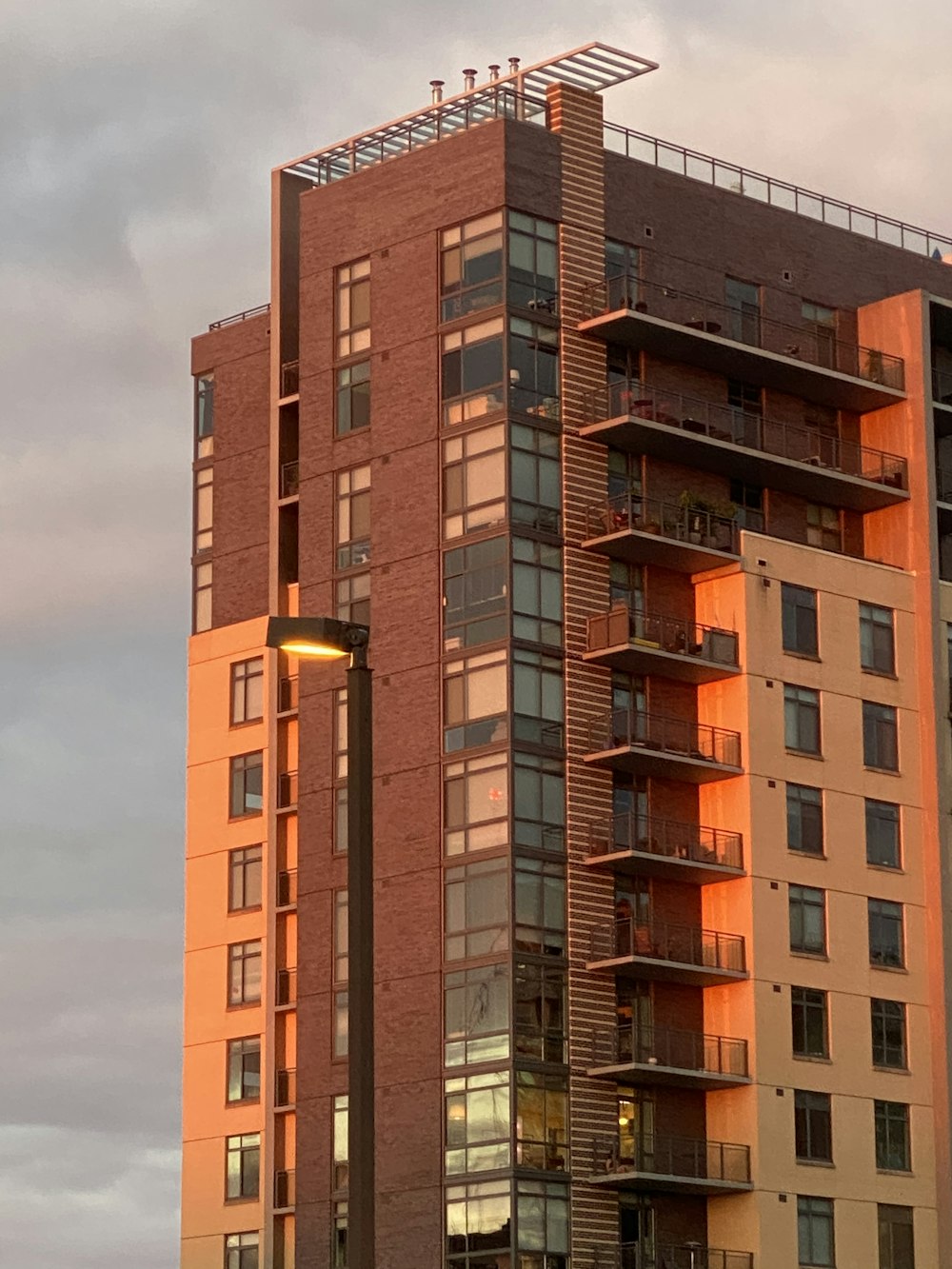 brown concrete building under gray sky during daytime