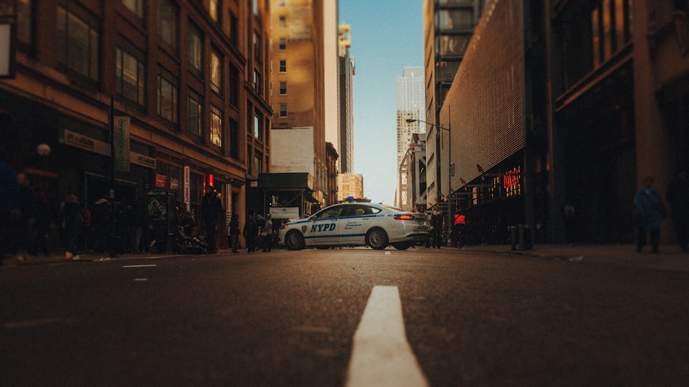 cars parked on side of the road during daytime