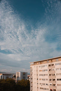 An aerial view of residential buildings in Lomé bathed in warm sunlight.