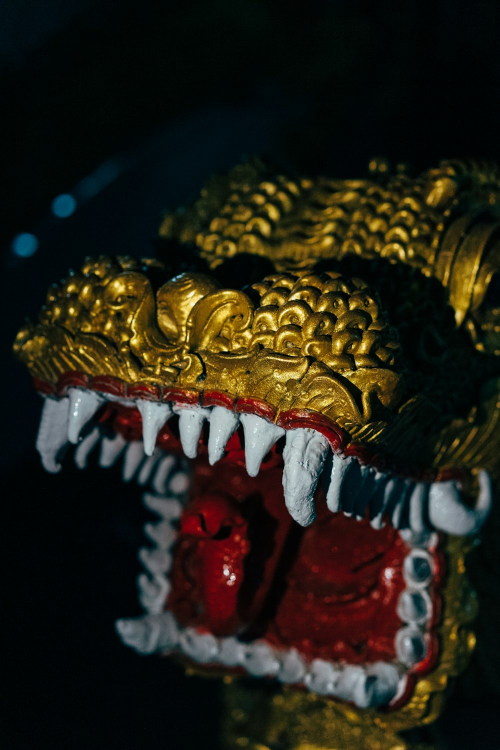 gold and red dragon figurine