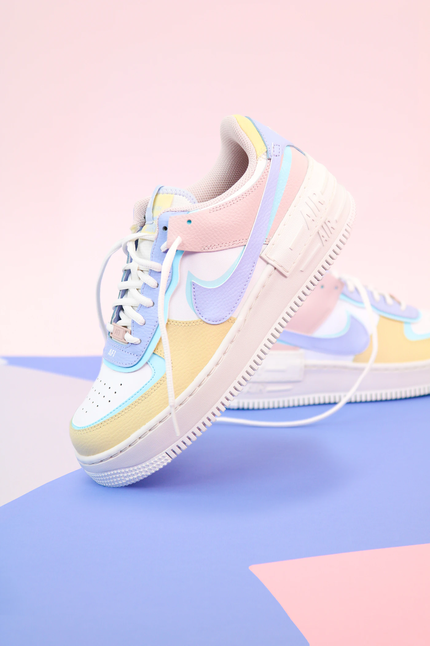 Colorful kids sneakers photographed with a bright premium editorial feeling