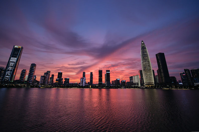 Shenzhen waterfront beneath a colourful sunset