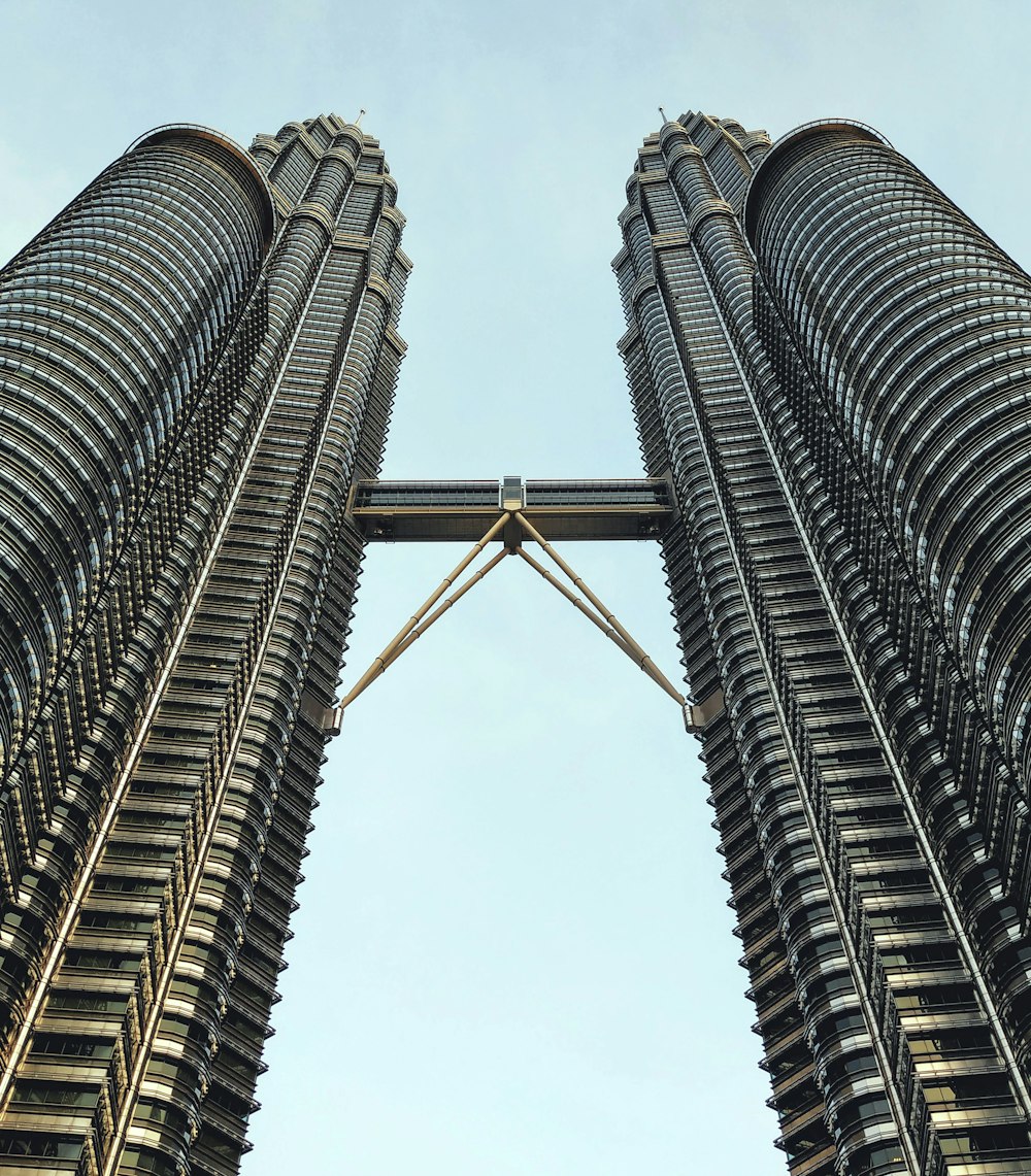 low angle photography of gray high rise building