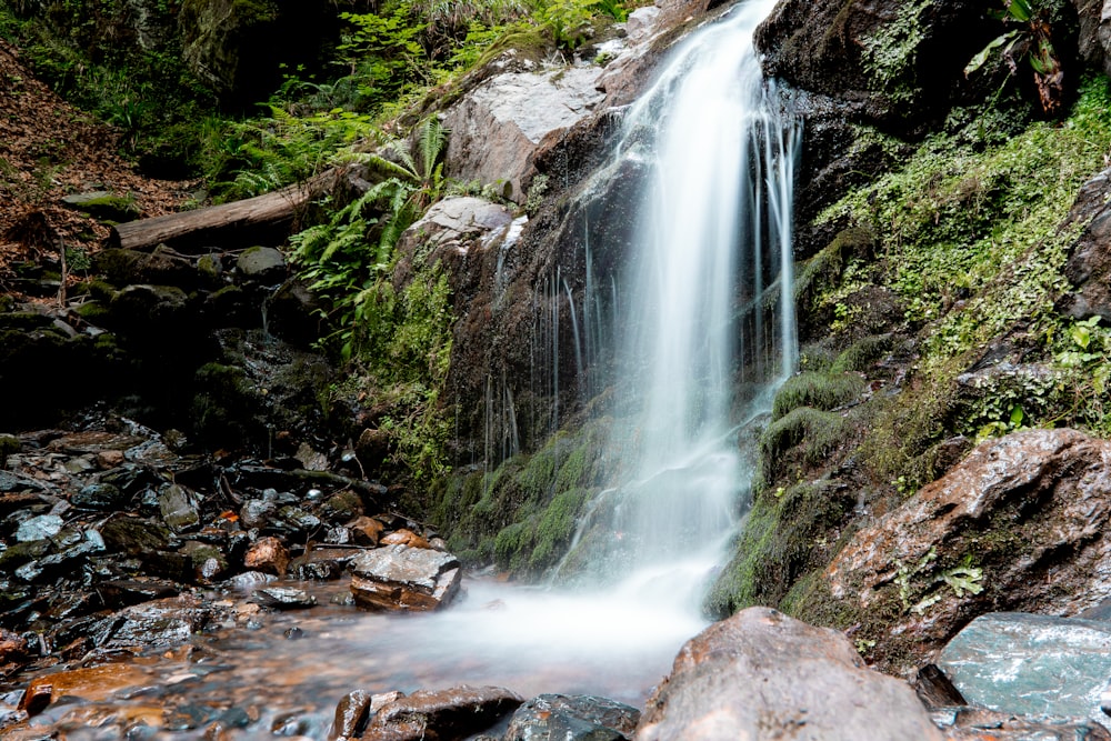 water falls on rocky ground