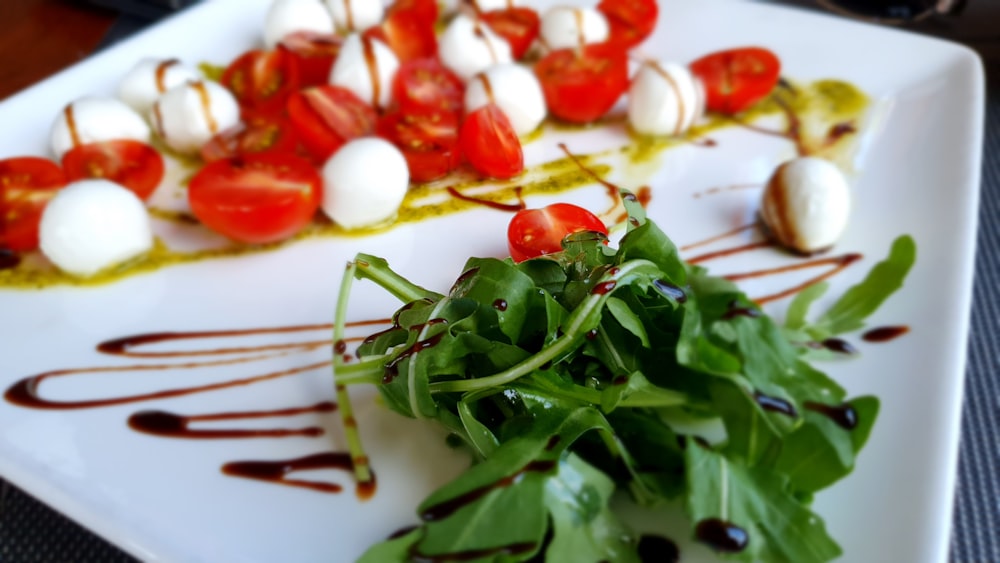 green vegetable on white ceramic plate