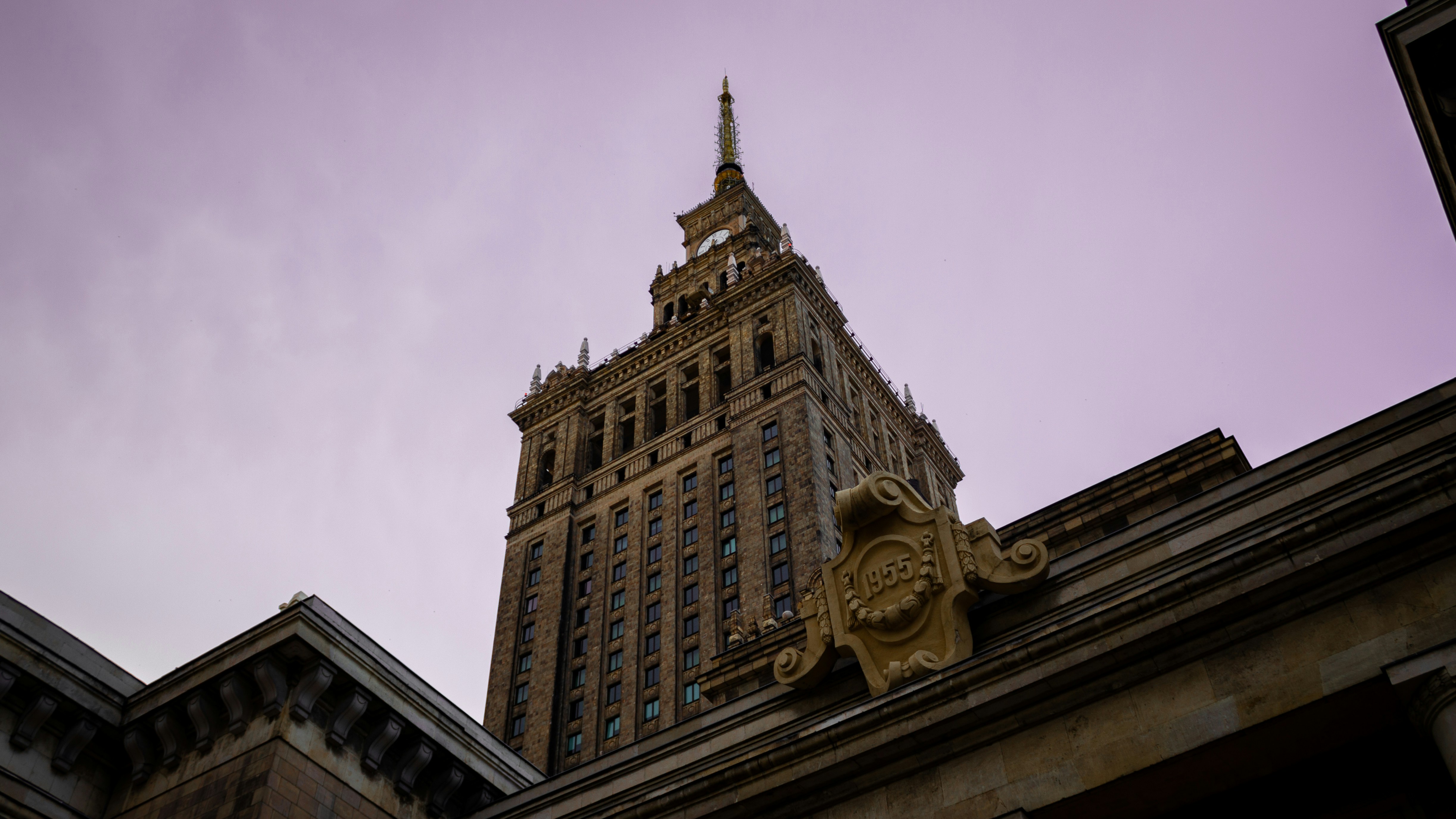 brown concrete building under white sky during daytime