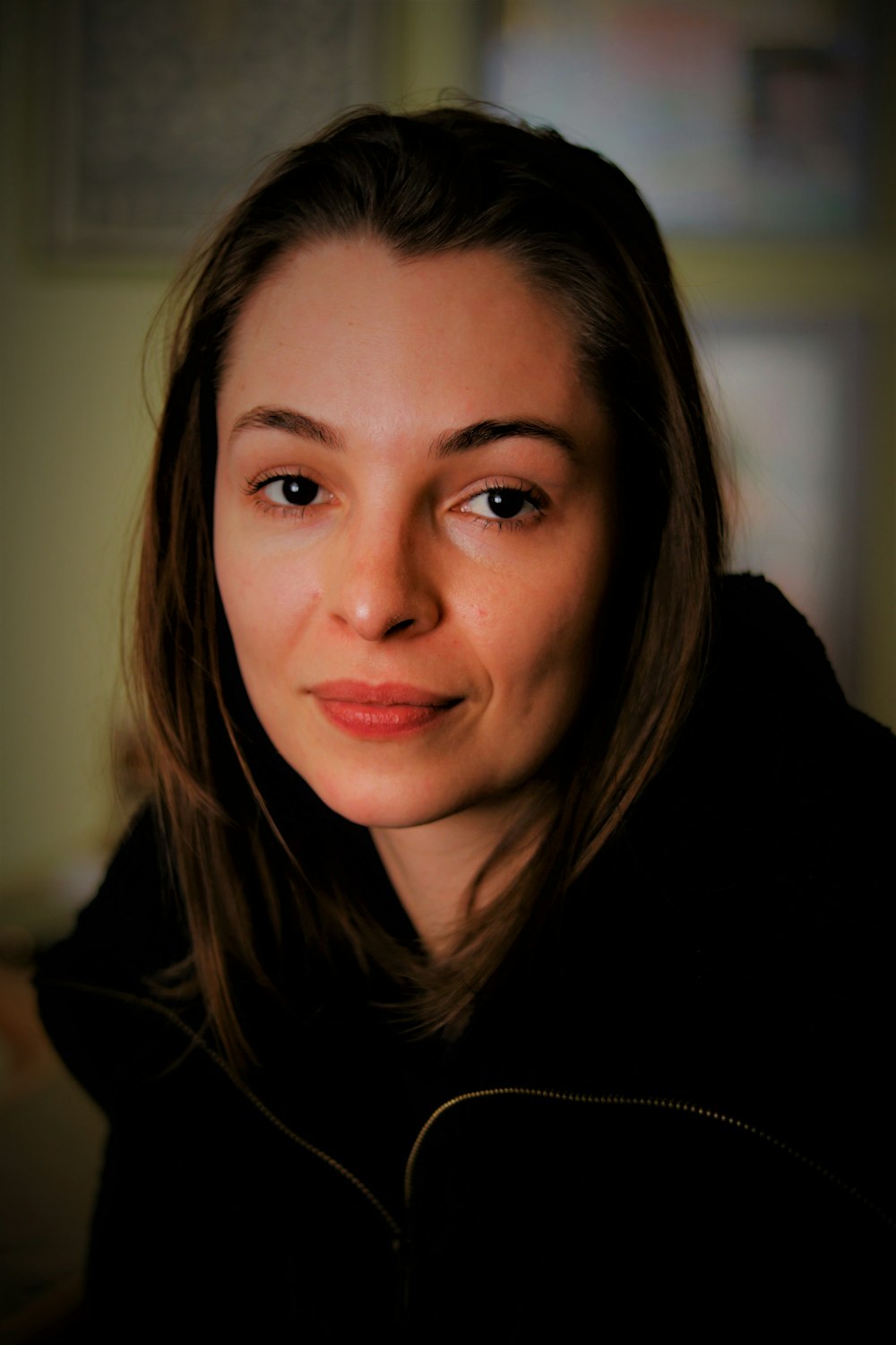 woman in black shirt smiling