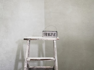 white and black wooden chair