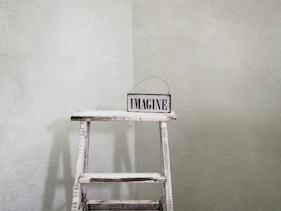 white and black wooden chair
