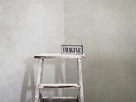 white and black wooden chair