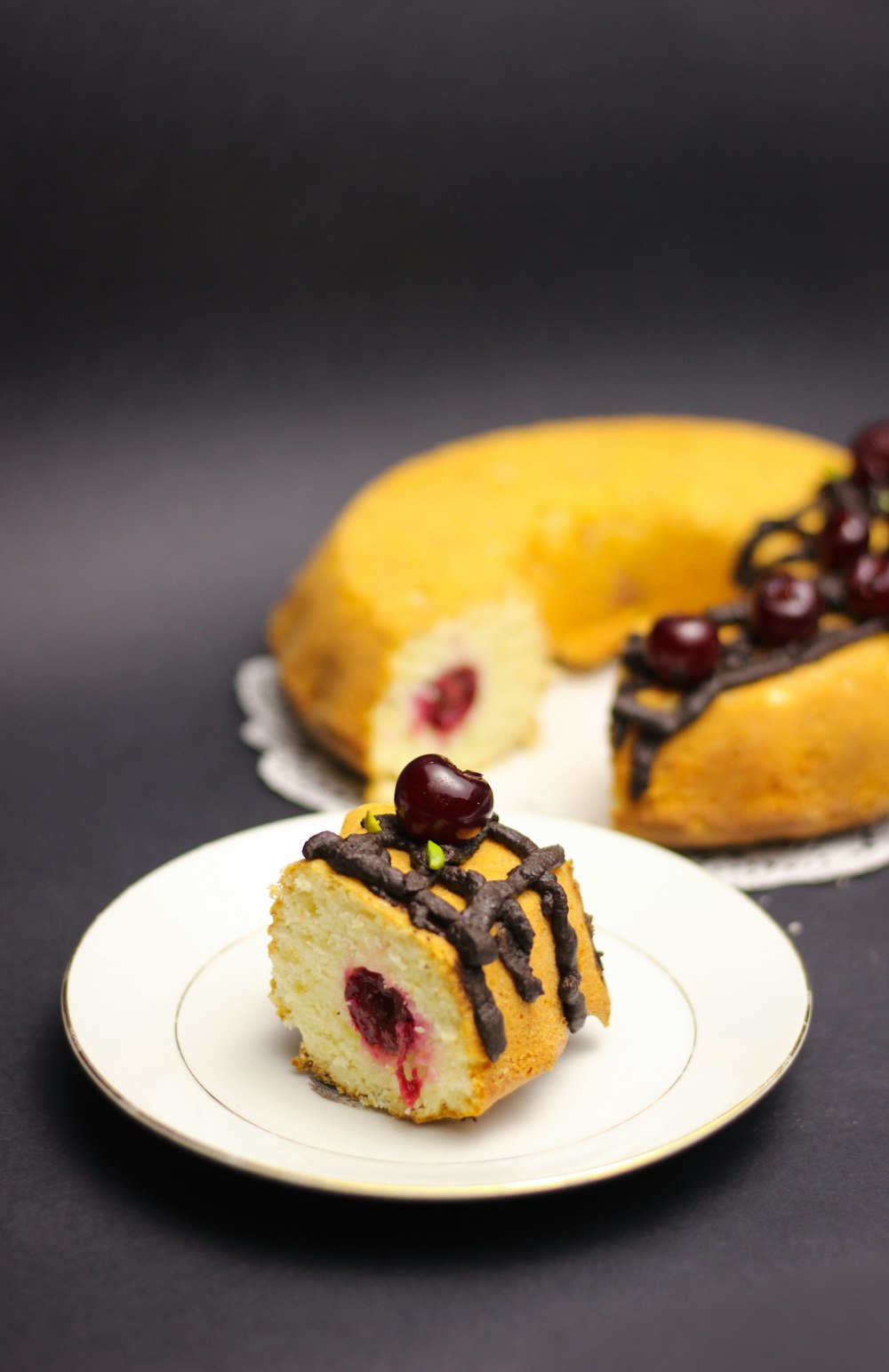 brown and black pastry on white ceramic plate