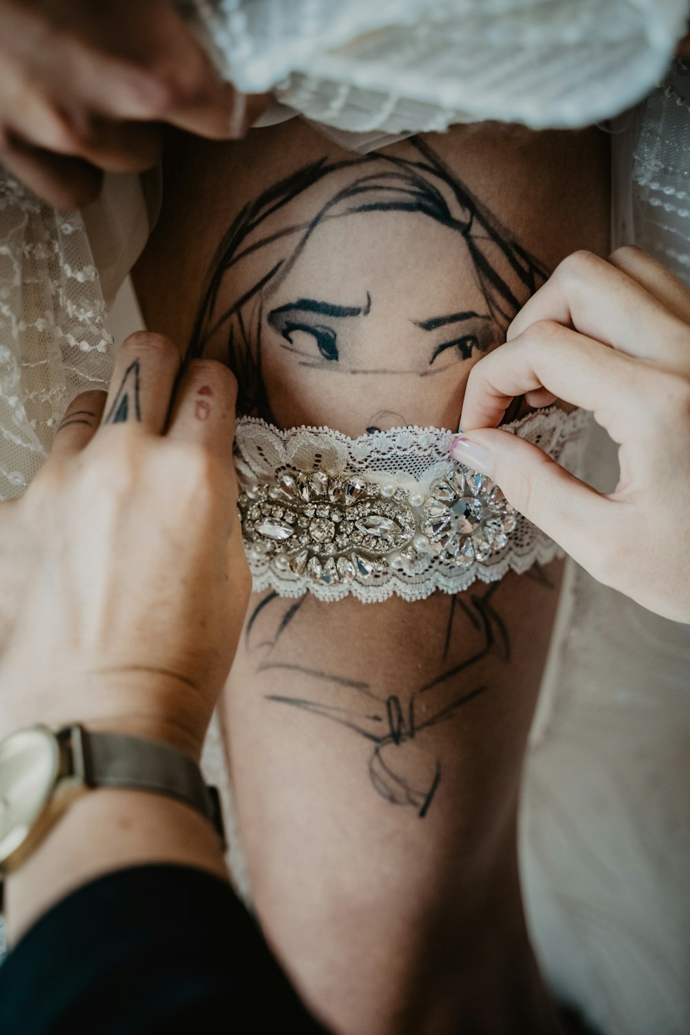 woman with rose tattoo on her right hand