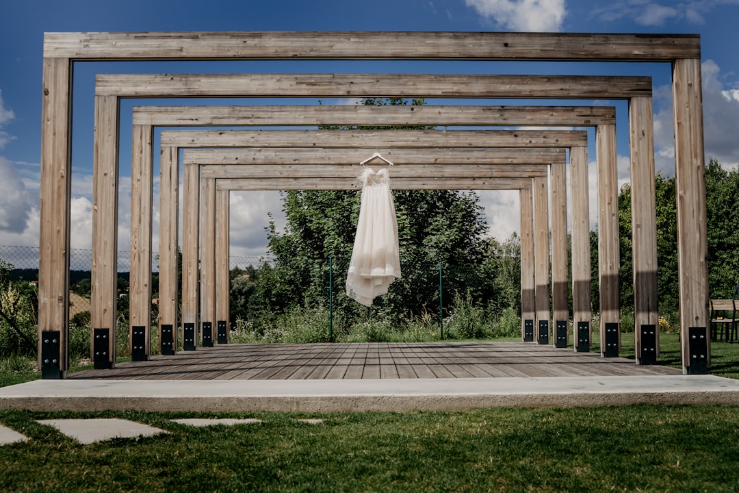 white concrete building near green grass field during daytime