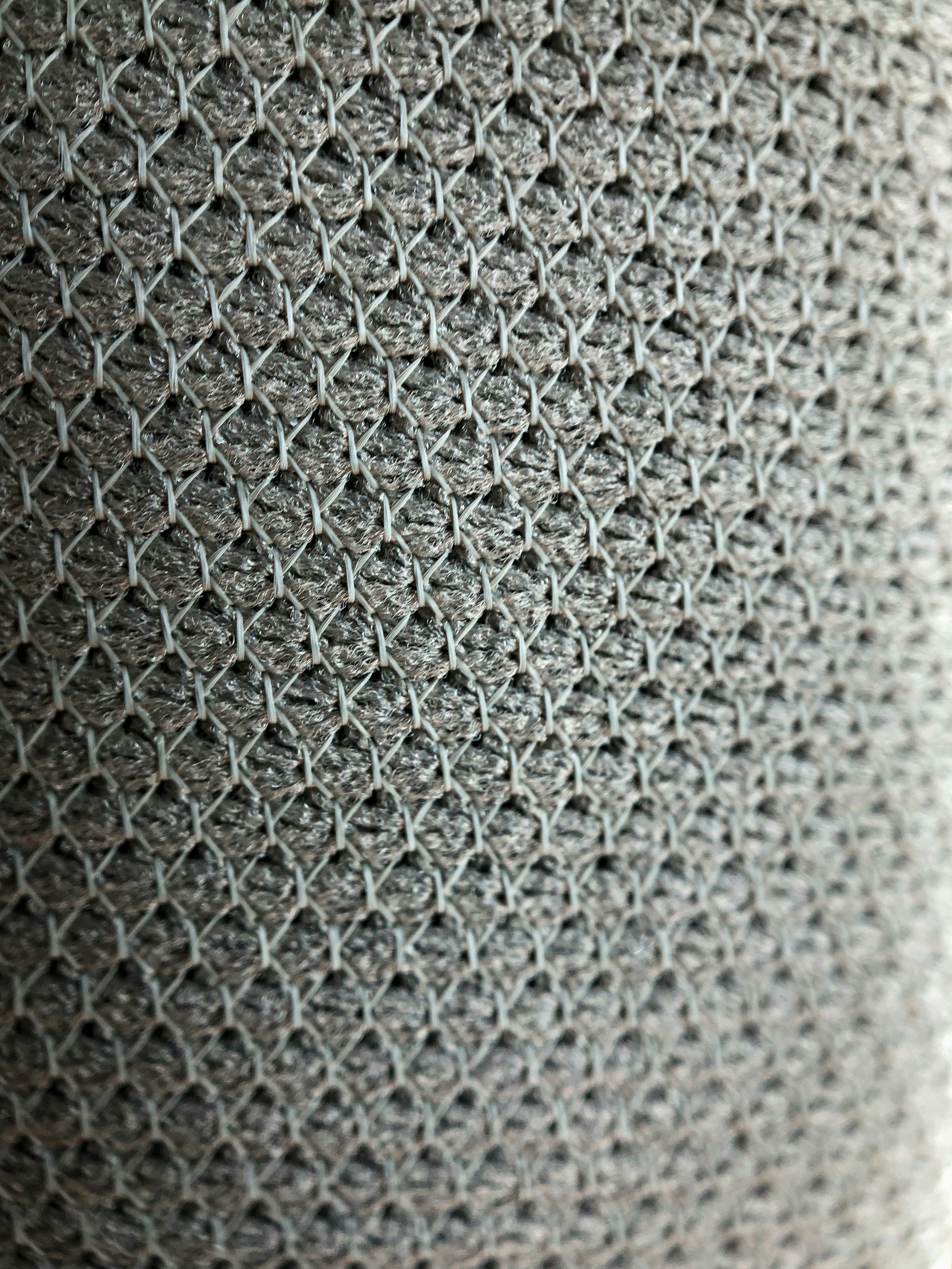 white and black knit textile