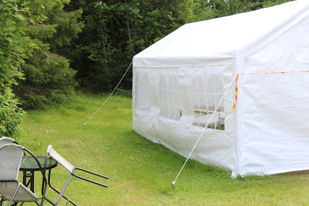 white tent on green grass field