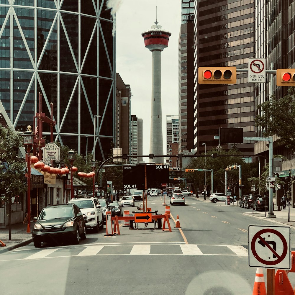 cars on road near buildings during daytime