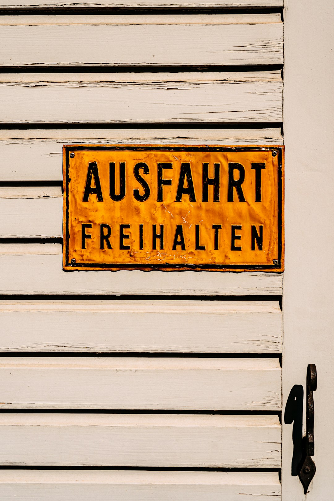 brown and black wooden signage