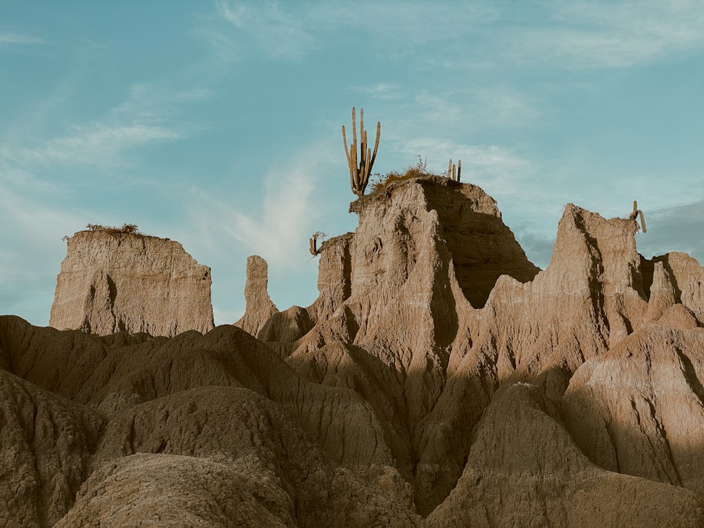 brown rock formation under blue sky during daytime