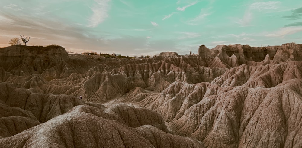 brown rock formation under blue sky during daytime