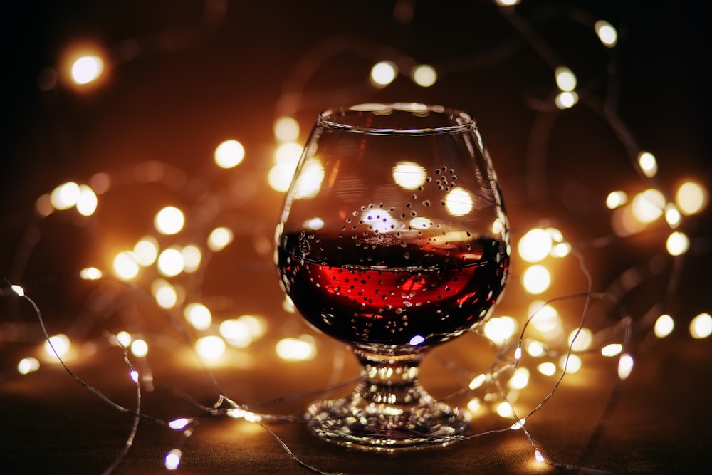 clear wine glass with red wine