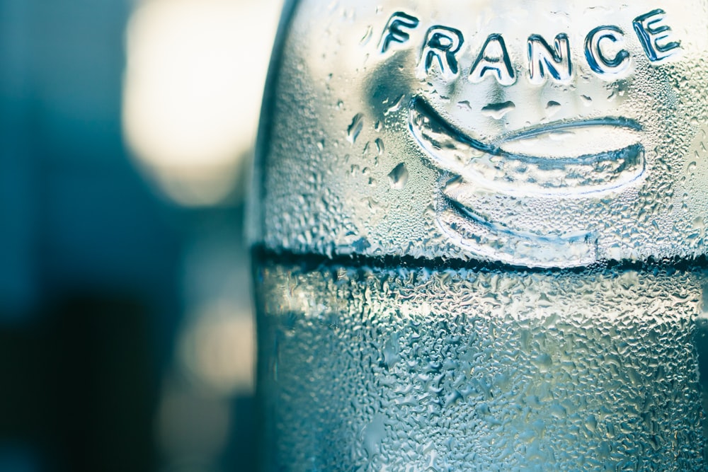 clear glass bottle with water droplets