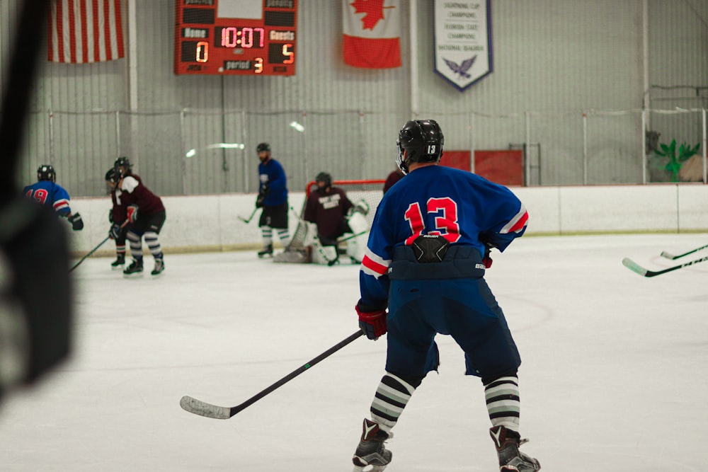 ice hockey players on ice hockey field