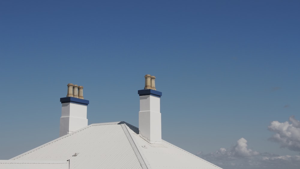 white concrete building under blue sky during daytime