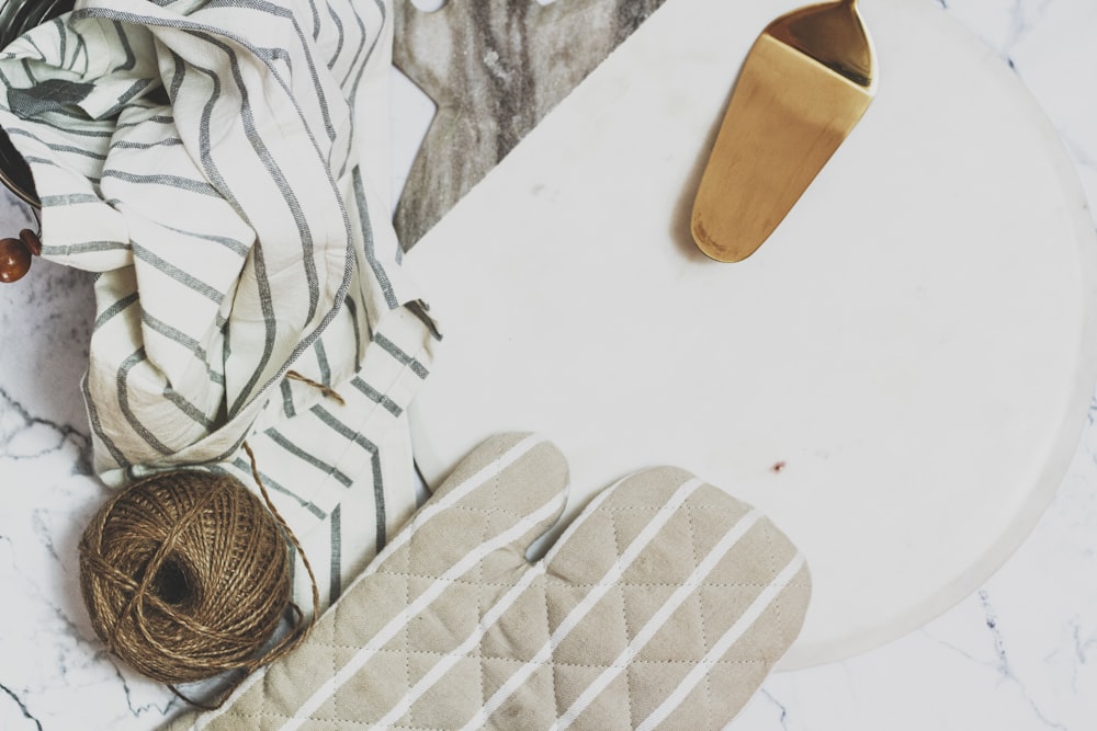 white and brown slide sandals