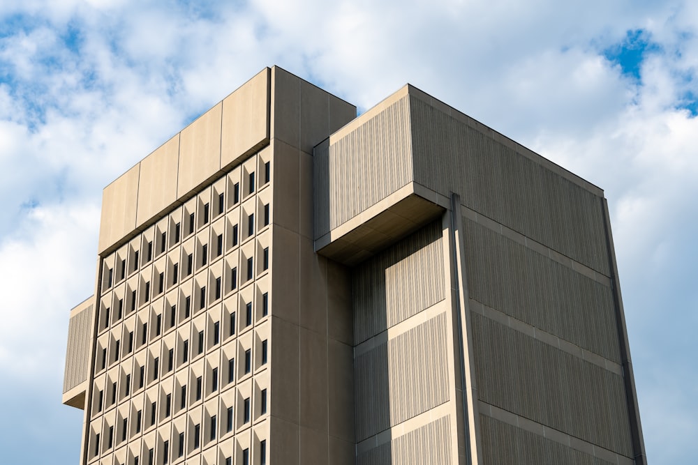 brown concrete building under blue sky during daytime