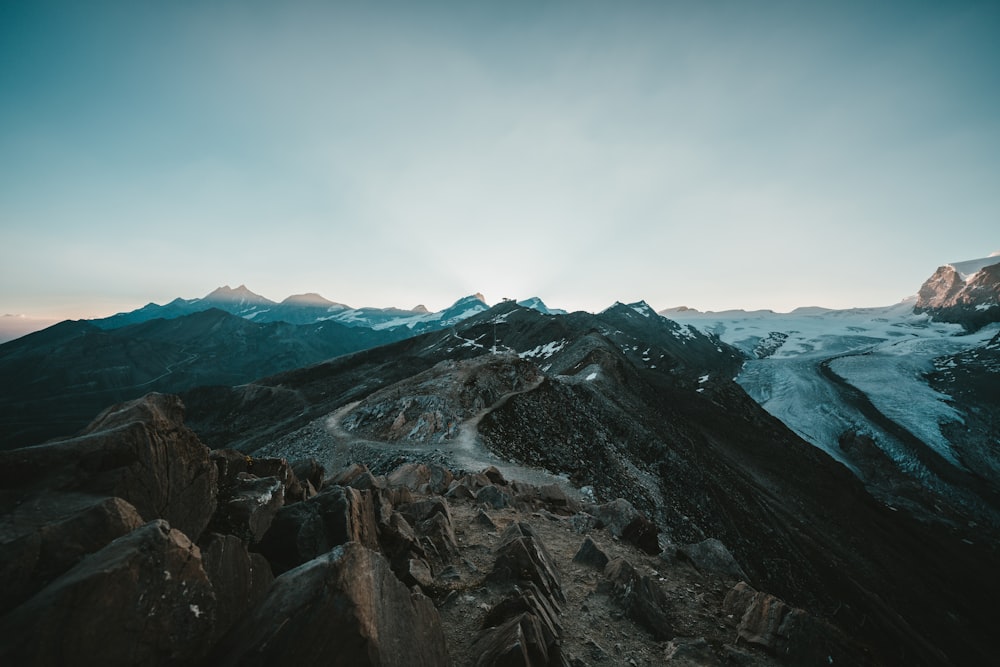 black and white mountains under blue sky during daytime