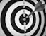 black and white round analog clock