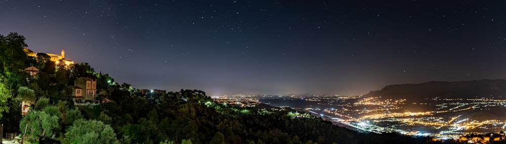 city lights turned on during night time