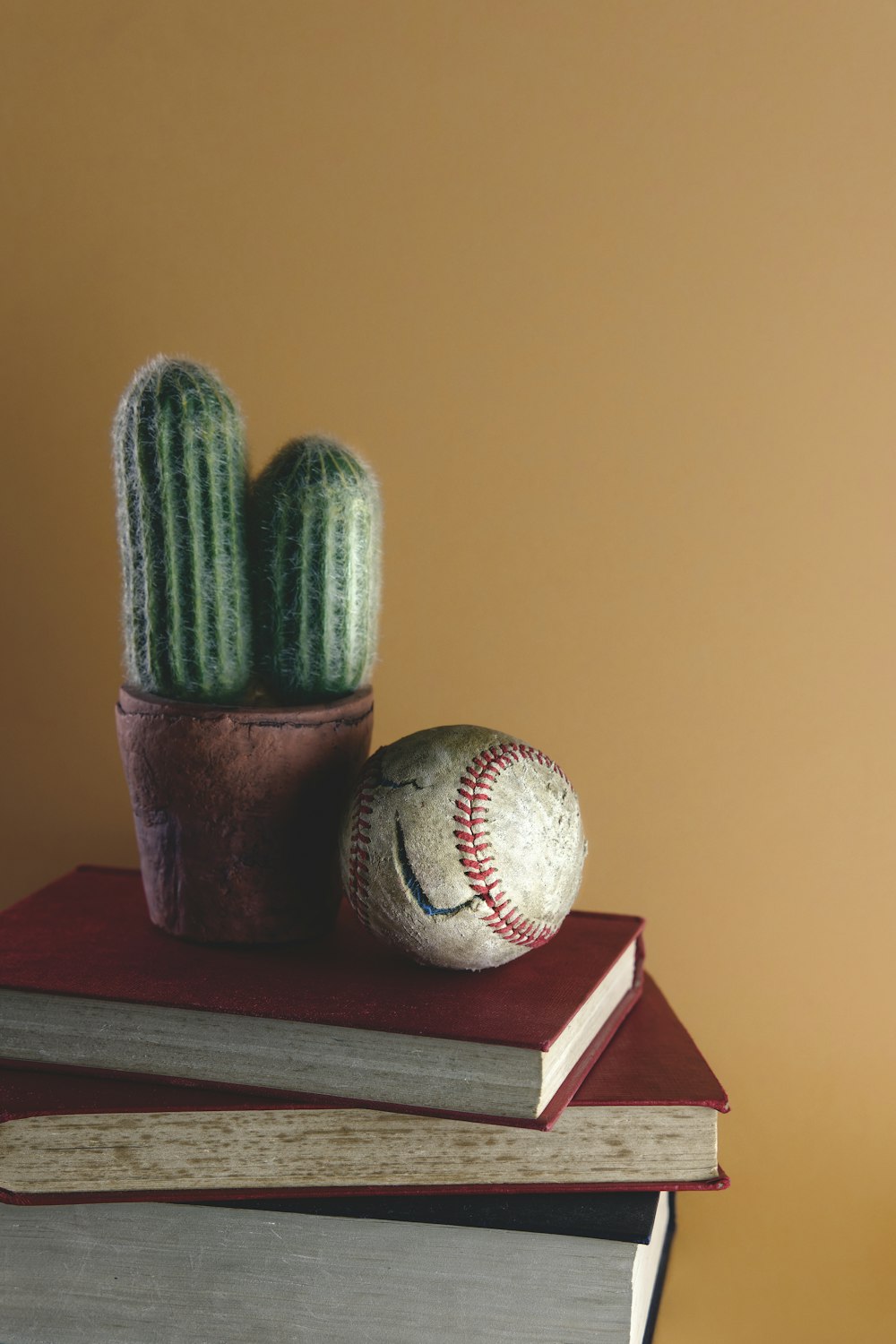 white baseball on brown wooden table