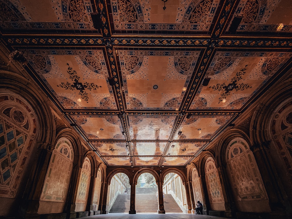 brown and white ceiling with light fixture