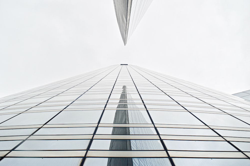 low angle photography of white concrete building