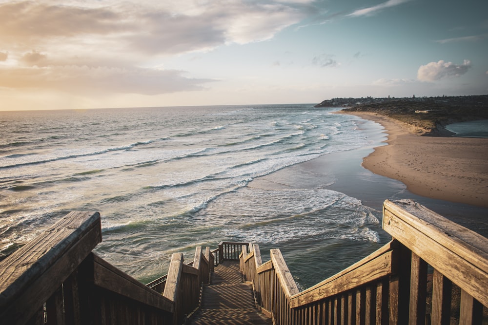 brown wooden dock on sea during daytime