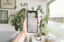 person holding black samsung android smartphone