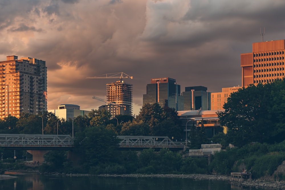 city skyline under cloudy sky during daytime