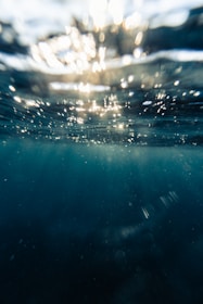 water droplets on blue surface