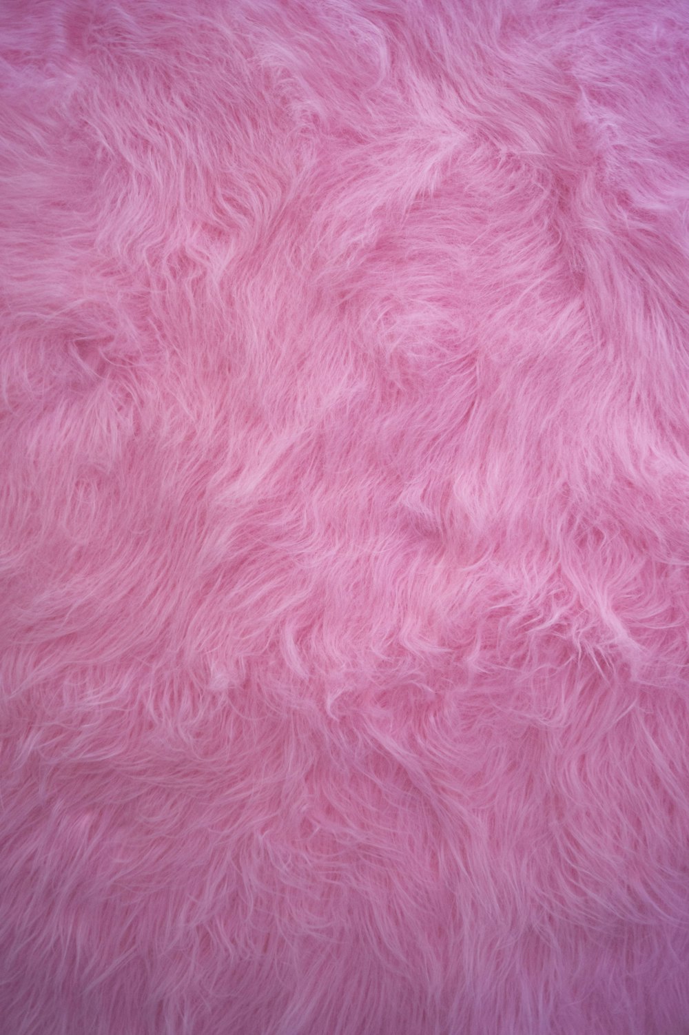 têxtil cor-de-rosa na fotografia de perto